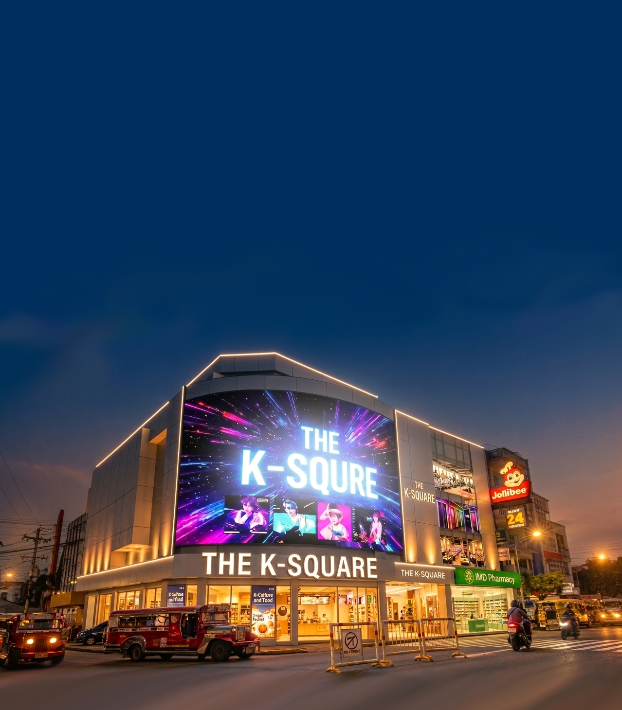 The K-Square building illuminated at night on Magsaysay Drive