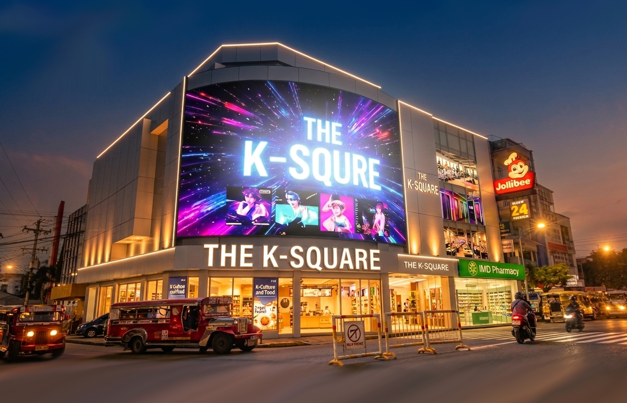 The K-Square building illuminated at night on Magsaysay Drive